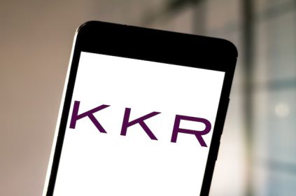 Smartphone with the KKR logo on the screen.